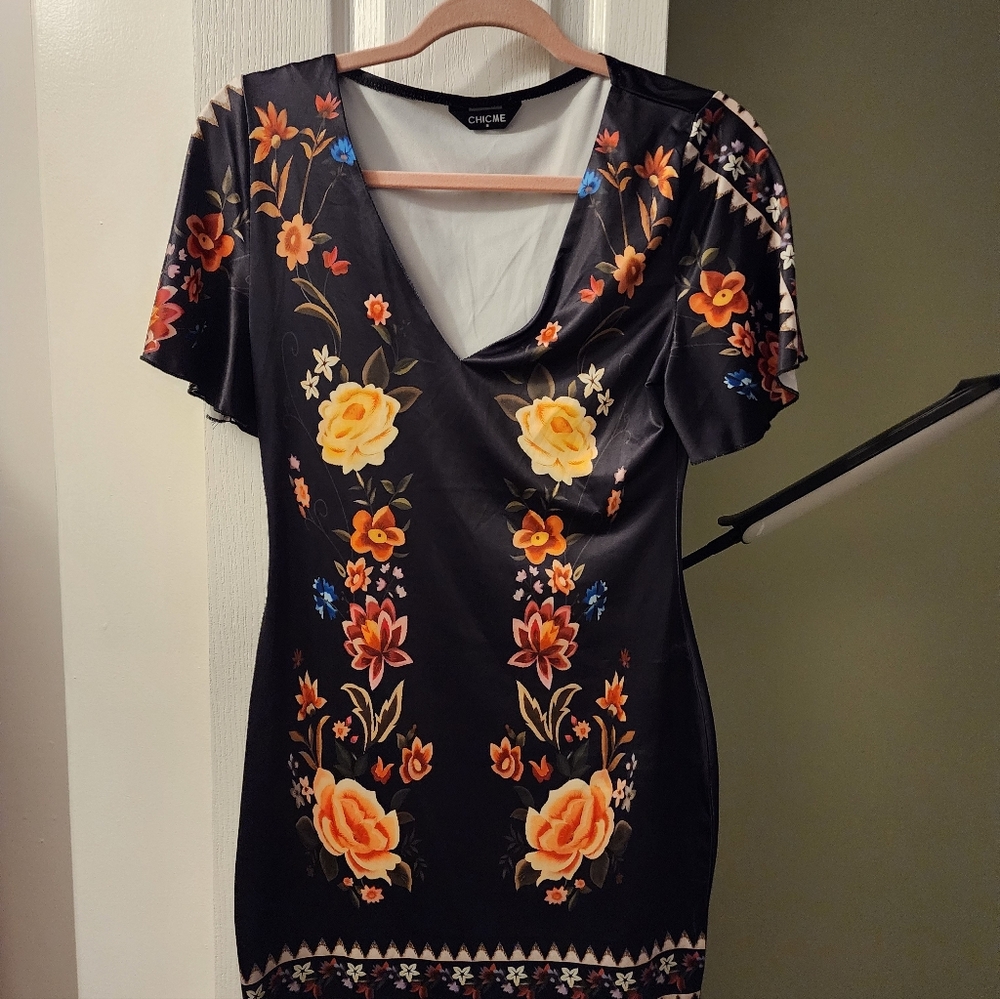 Chic Black Dress with Orange Floral Design